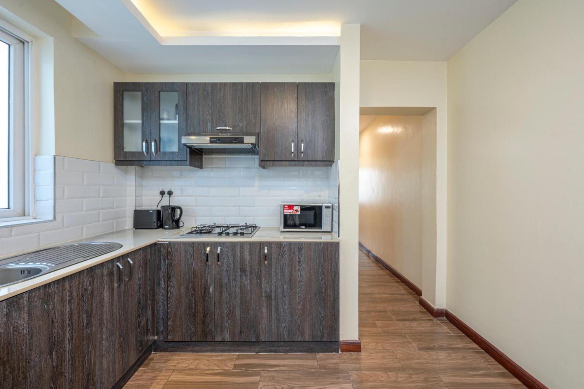 Roma Court Serviced Apartments Найроби Экстерьер фото